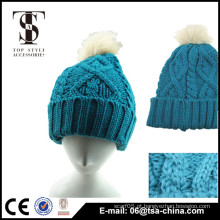 As mulheres feitas sob encomenda vendendo quente plantam o azul beanie do knit